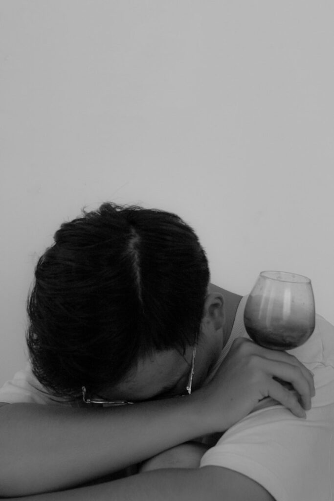 a woman with a glass of wine