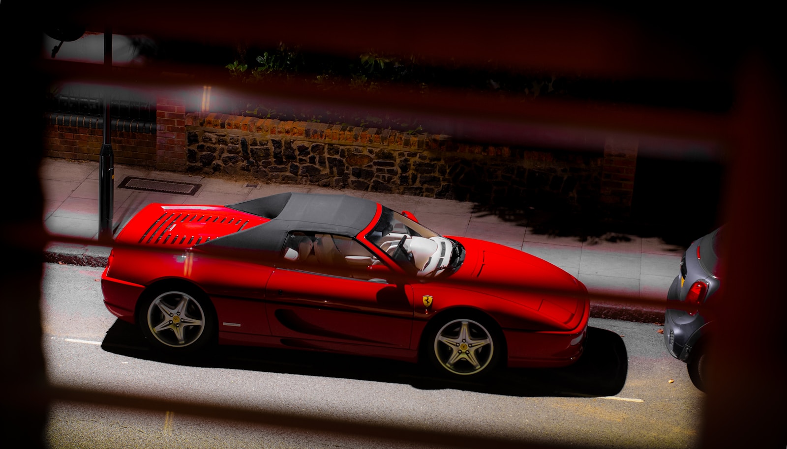 red ferrari 458 italia on road