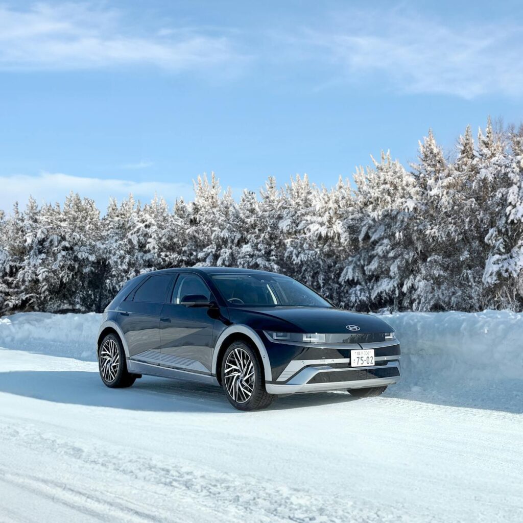 Hyundai Ioniq 5 electric car on a snowy road in Sapporo, Japan.