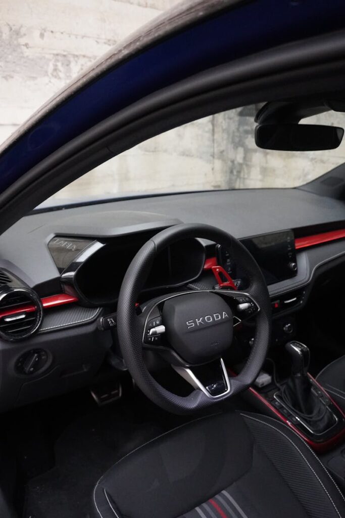 Explore the sleek and sporty interior of a modern Skoda vehicle, showcasing premium features.