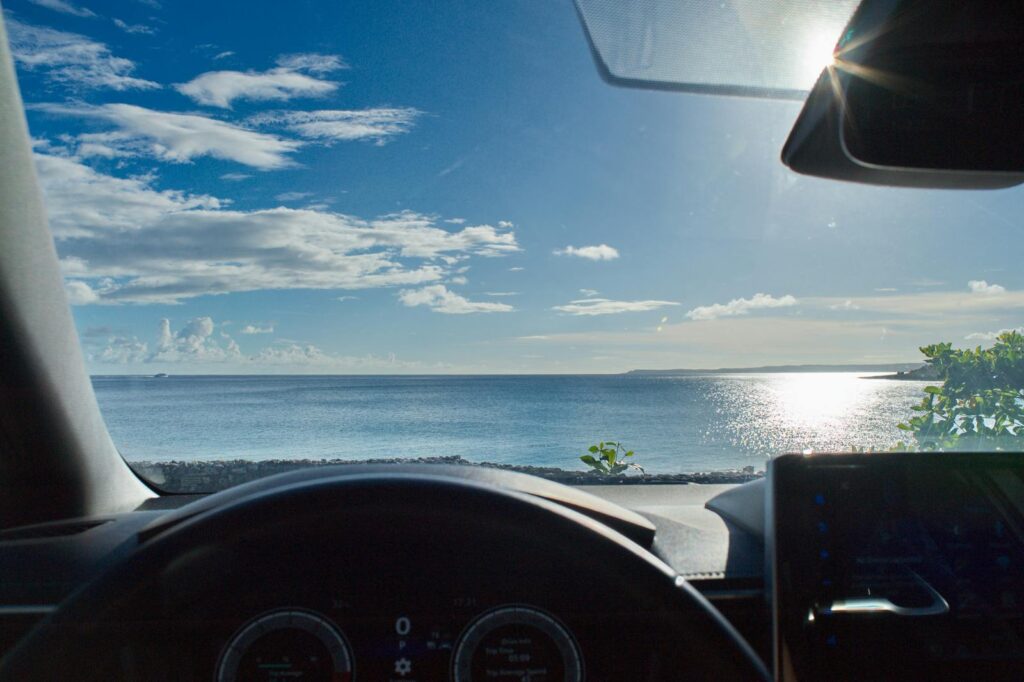 ocean view from inside of a car