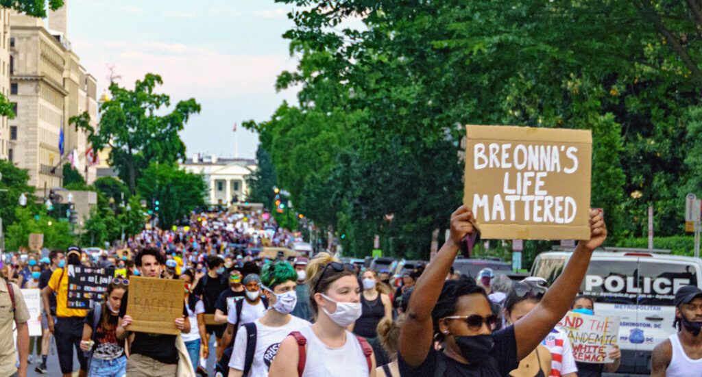 Voices of Dissent: Protesters Confront Federal Presence.