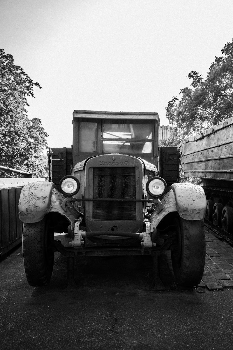 a black and white photo of an old truck