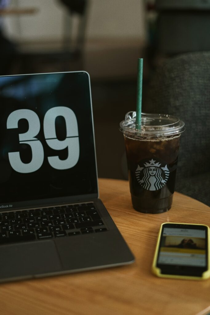 a drink and a laptop