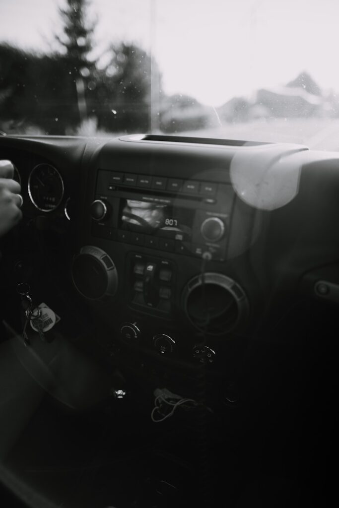 person driving car during daytime