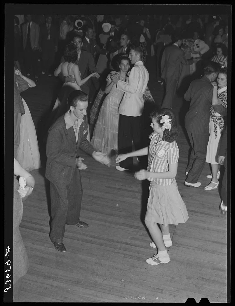 dirt-floor dance hall scene