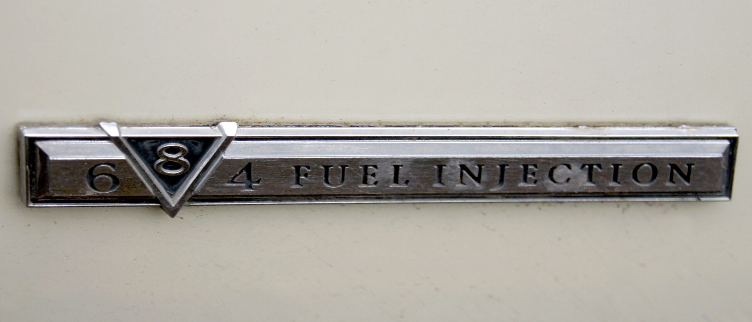 Cadillac De Ville nameplate