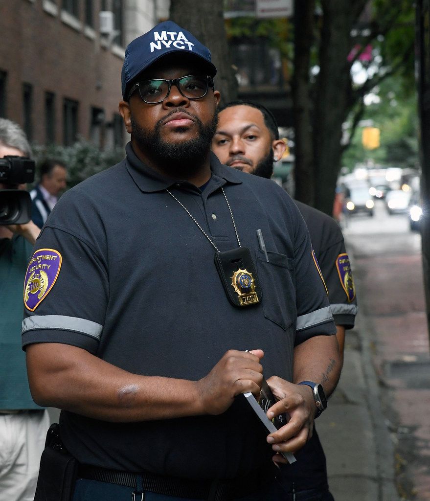 Black security officer Tesla