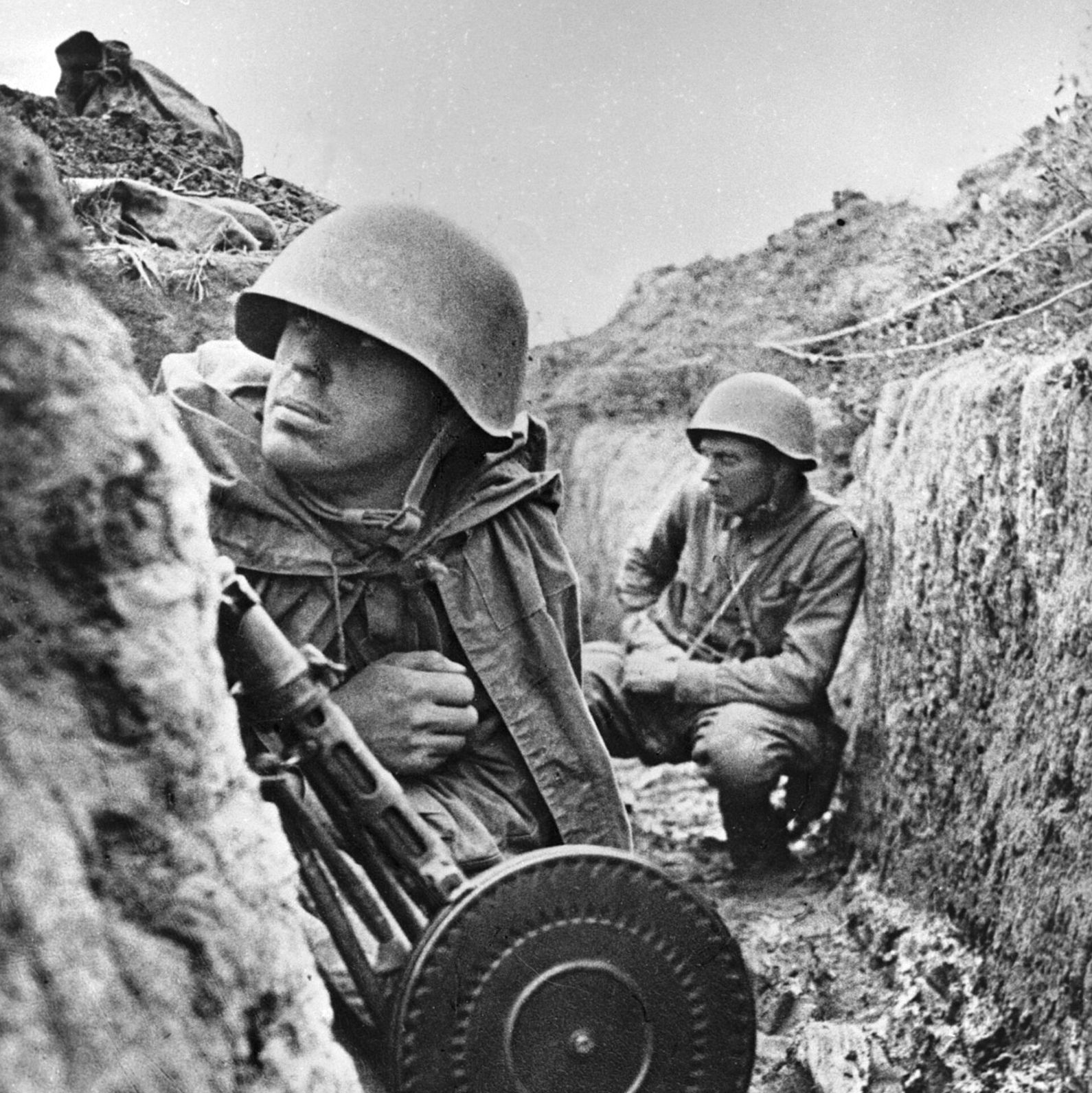 advancing Russian forces collecting fallen soldiers