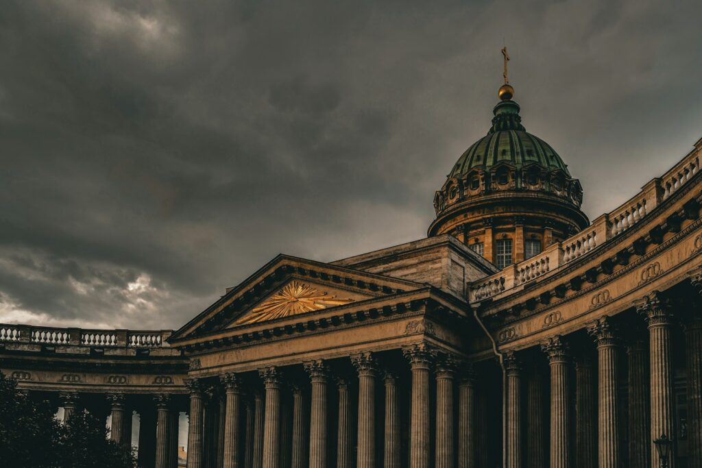 a building with columns and a dome on top
