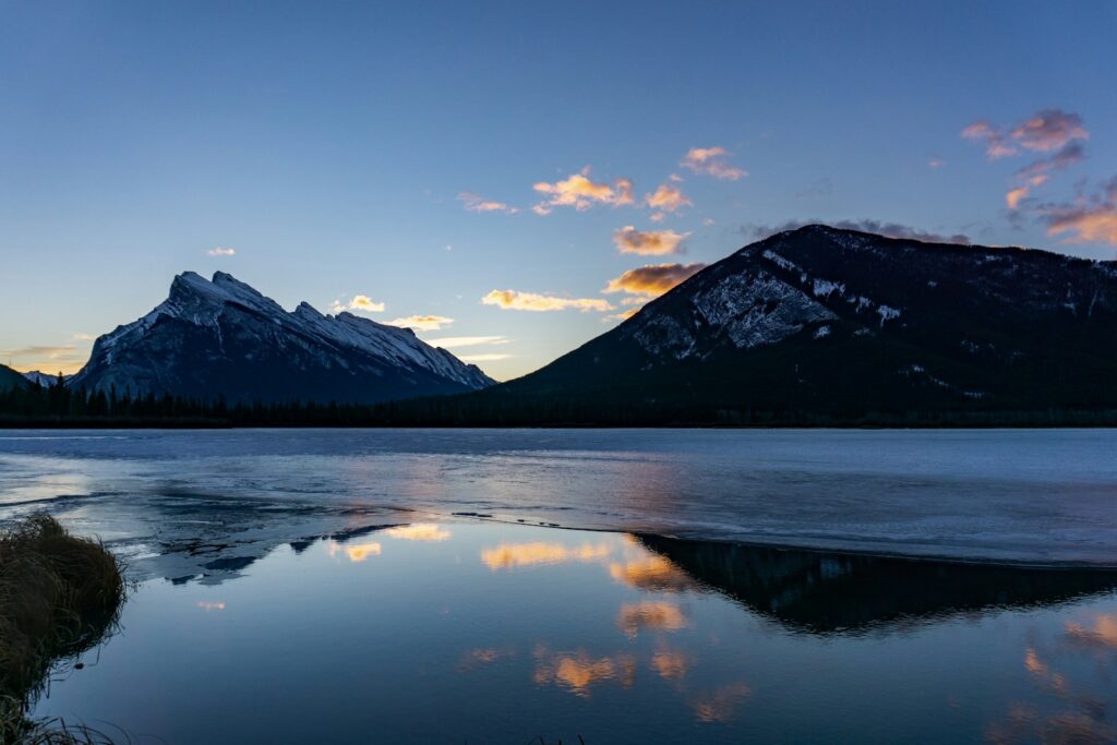 a lake with a mountain in the background