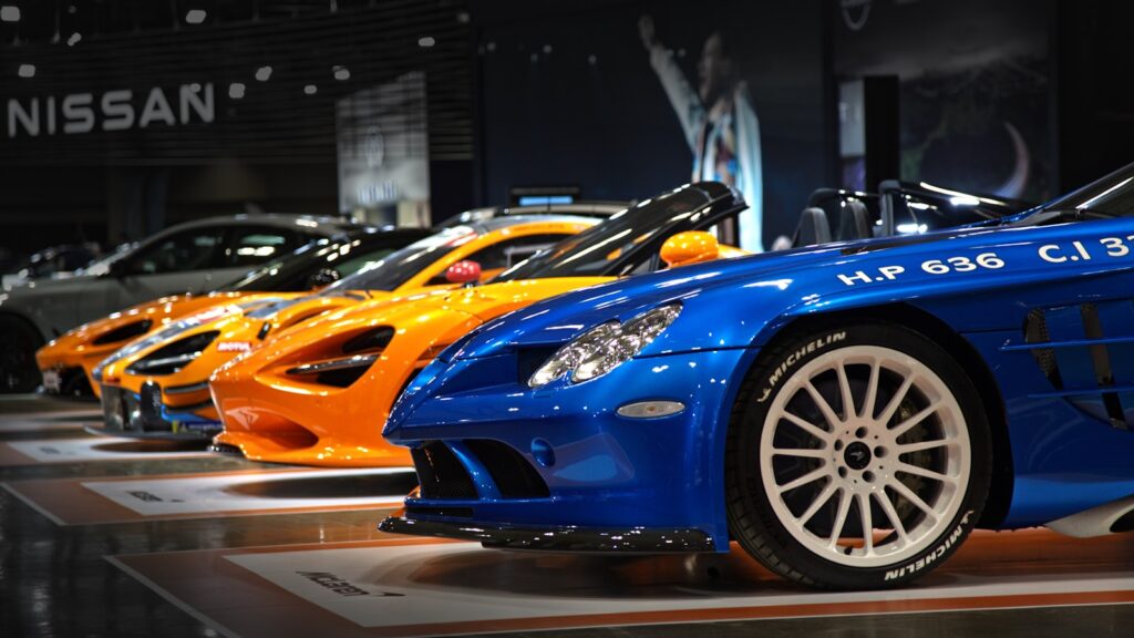 A bunch of cars that are on display