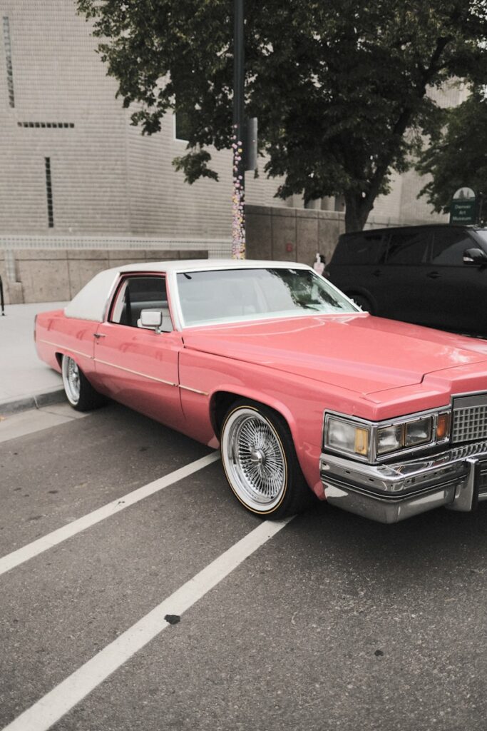 a red car parked in a parking lot