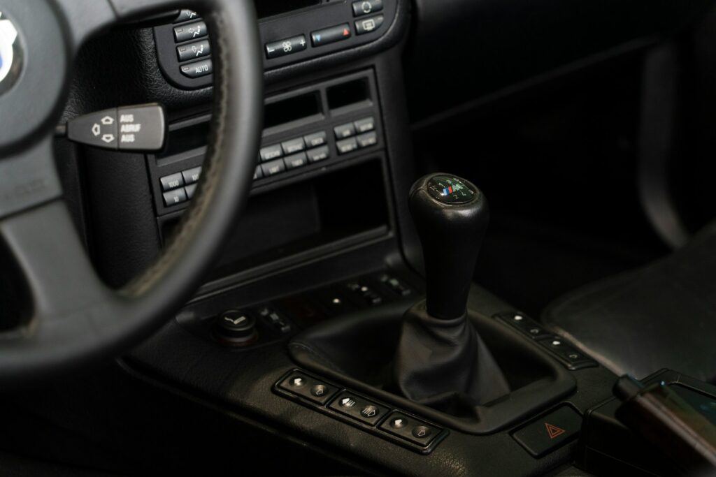 a steering wheel and dashboard of a car