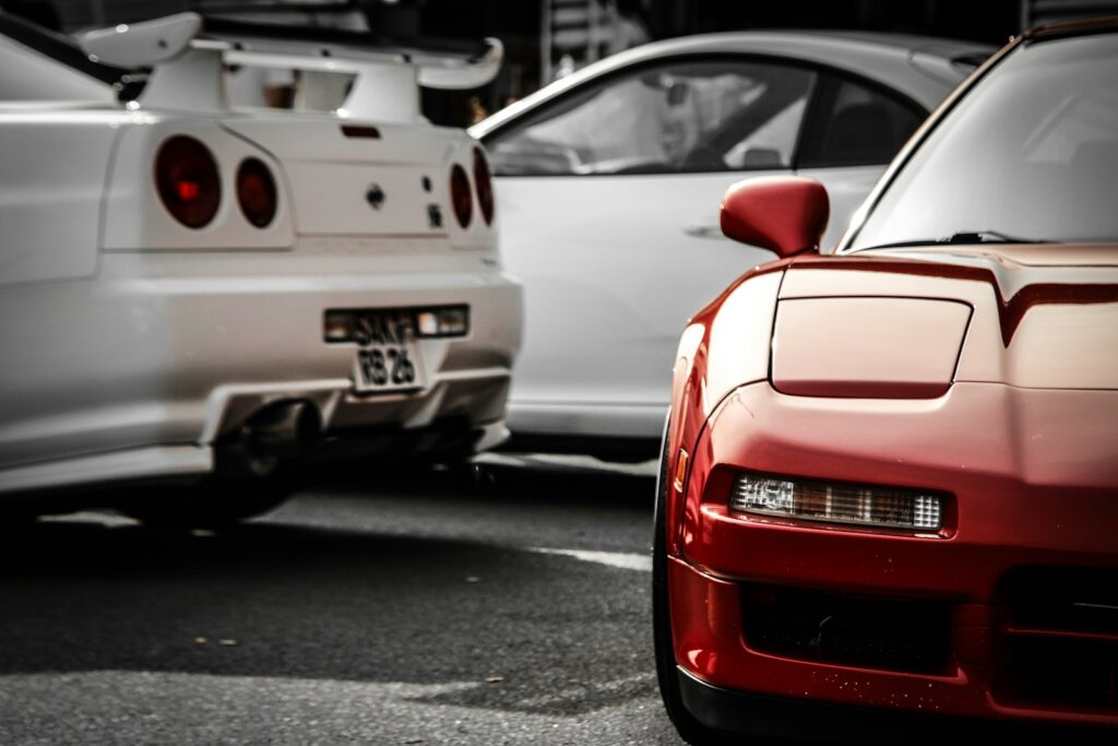 Sportscars are parked side by side, showcasing the design.