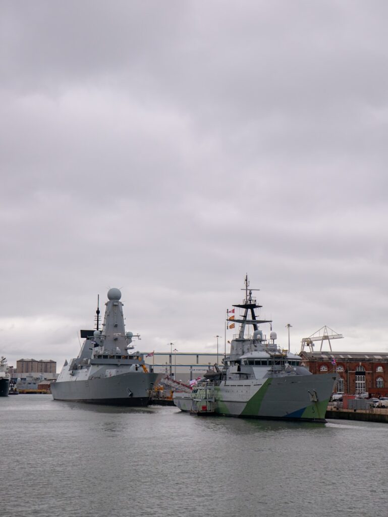 A couple of boats that are sitting in the water