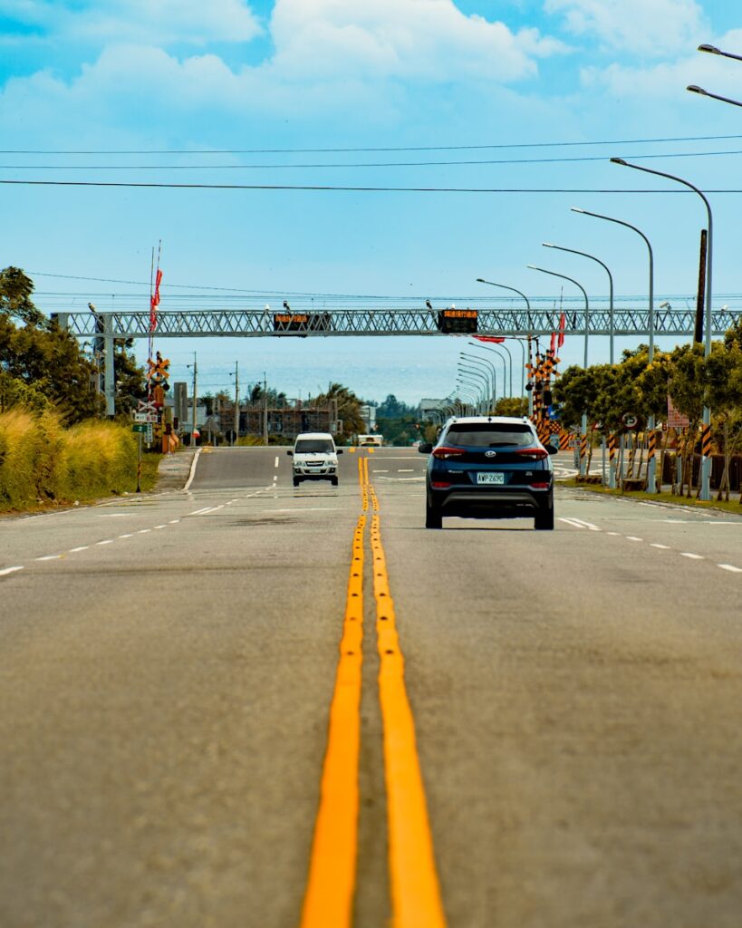 black car on road during daytime