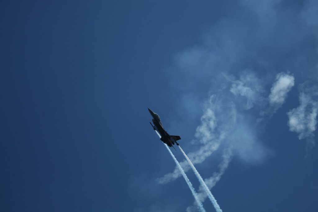 a fighter jet flying through the air