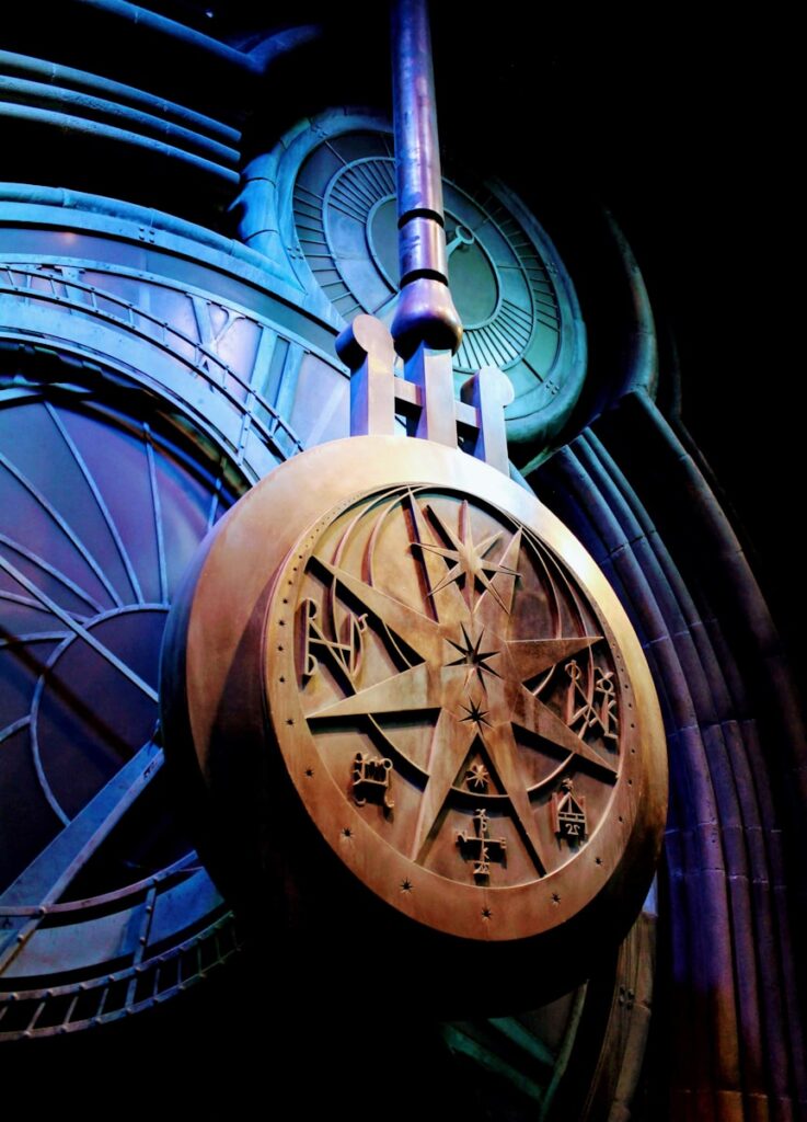 a close up of a clock on a building