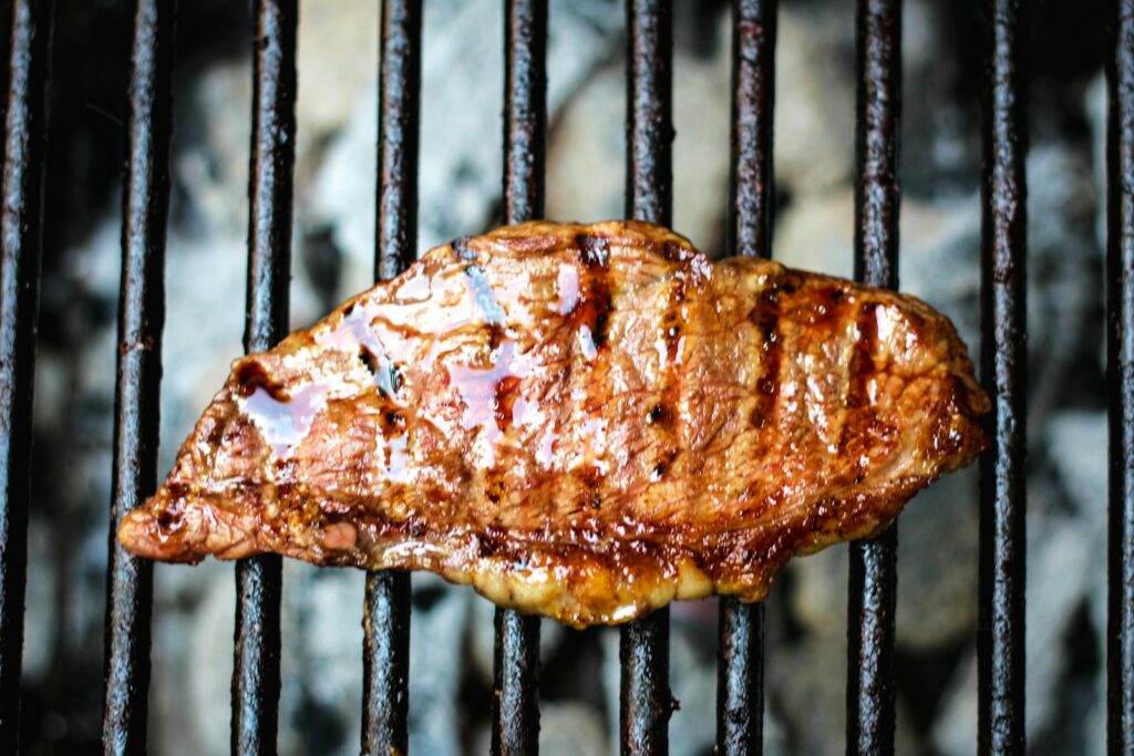 a piece of meat on a grill