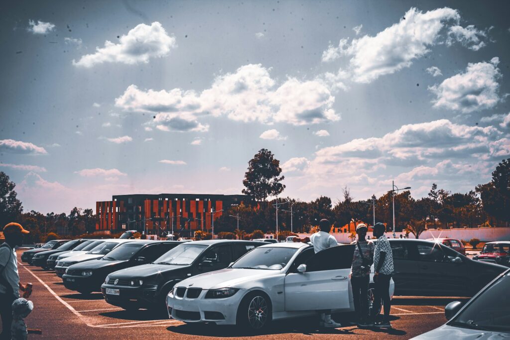 a group of cars parked in a parking lot