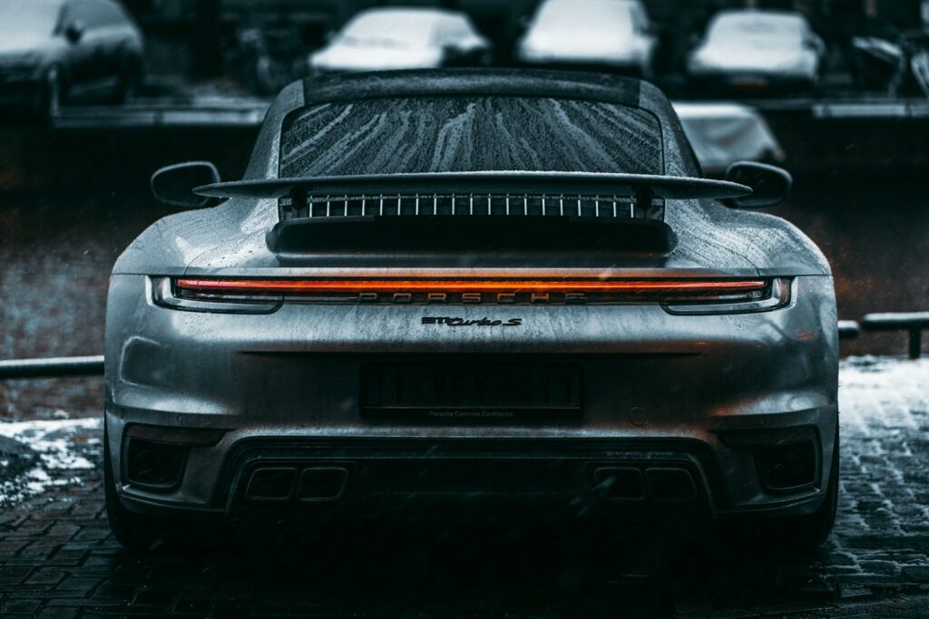 black car in grayscale photography