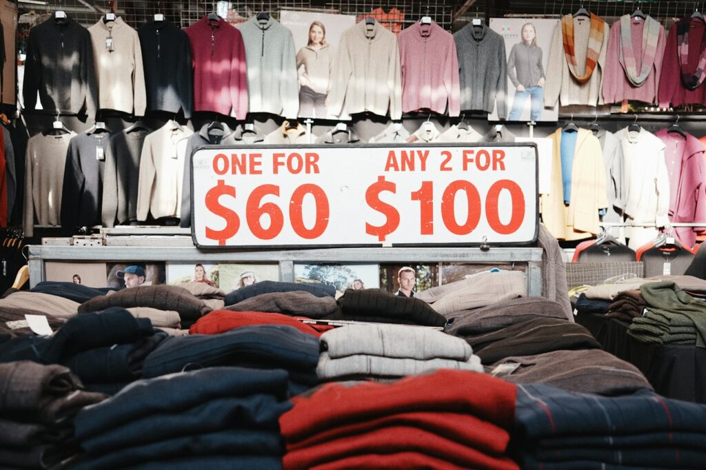 Sweaters are on sale with two for $100.