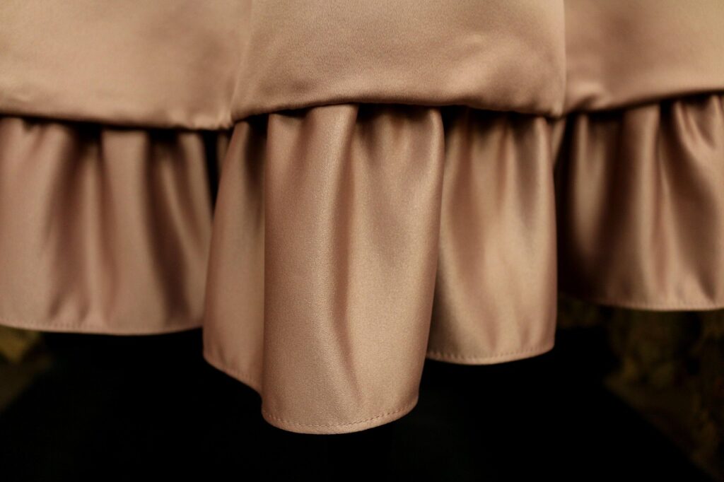 ruffle, hemline, hem, satin, ruffle, ruffle, ruffle, hem, hem, hem, hem, hem, satin, satin