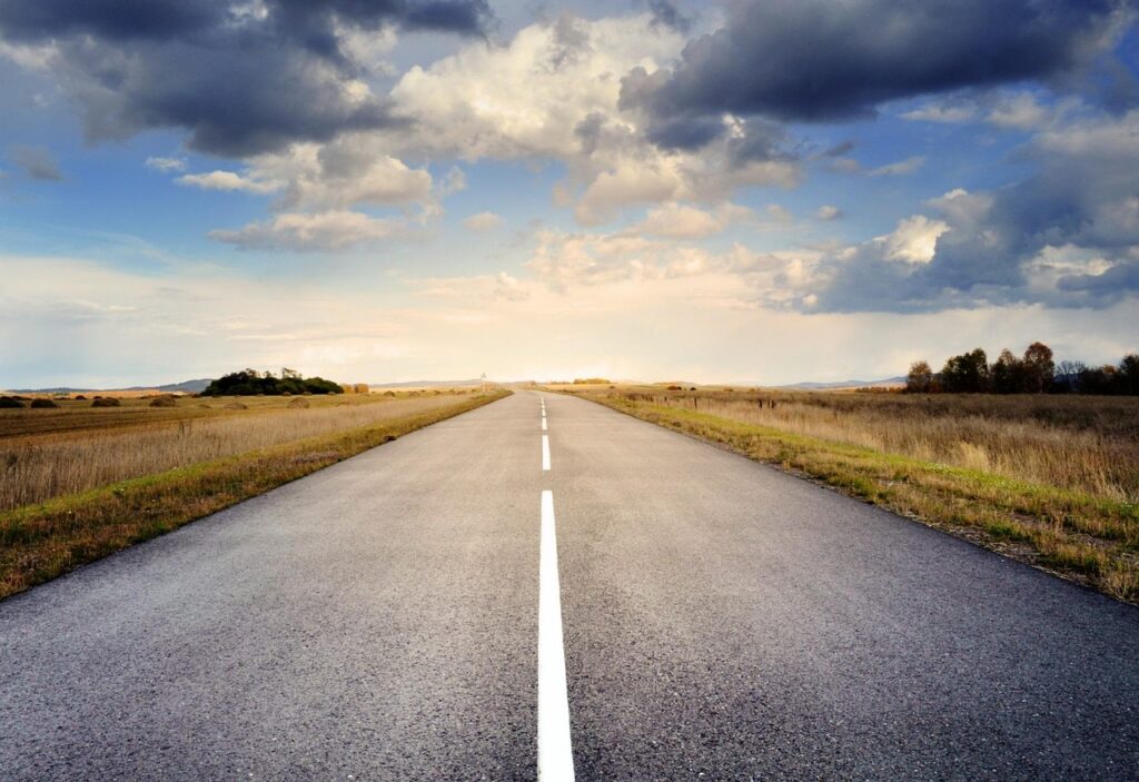 road, pavement, landscape, roadway, drive, route, way, nature, asphalt, countryside, horizon, fields, clouds, sky
