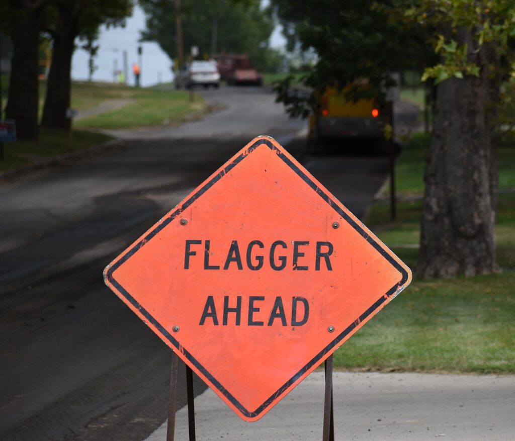 flagger, construction, road, safety, sign, flagman, orange, flagger, flagger, flagger, flagger, flagger