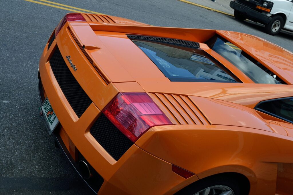 lamborghini, tail light, fast car, race car, stock car, racing, hot rod, break lights, trunk, tangerine, red orange, style, orange lamborghini, vehicle, low rider, bran new, new, license plate, glass, tinted windows, sports car, luxury, luxurious, expensive, high commodity, depreciation of value, life insurance, orange, auto, star, automobile, bus, convertible, jeep, limousine, machine, motor, pickup, ride, station wagon, truck, van, wagon, bucket, buggy, compact, conveyance, coupe, hardtop, hatchback, heap, jalopy, junker, motorcar, roadster, sedan, subcompact, low rider, license plate, tinted windows, life insurance, life insurance, life insurance, life insurance, life insurance, jeep