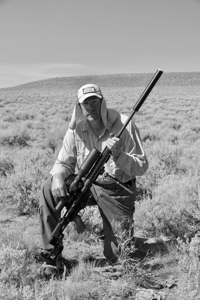 long range shooting, nomad rifleman, long range rifle, sniper rifle, man with rifle, gun, rifle, shooting instructor, gray gun