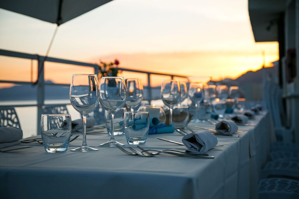 table, glassware, cutlery, silverware, stemware, dining table, dinner table, table setting, nature, table set-up, dinner, luxury, restaurant, sunset