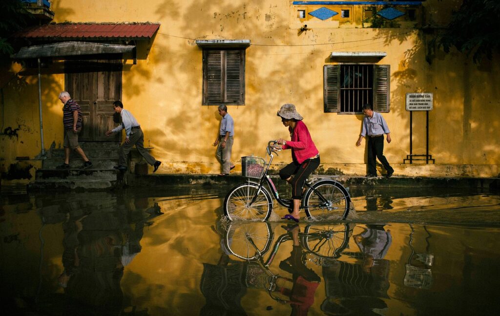 biking, street, flood, city, bike, bicycle, nature, bicycle ride, riding bike, flooding, water, water reflection, road, hoi an, vietnam, flooded street