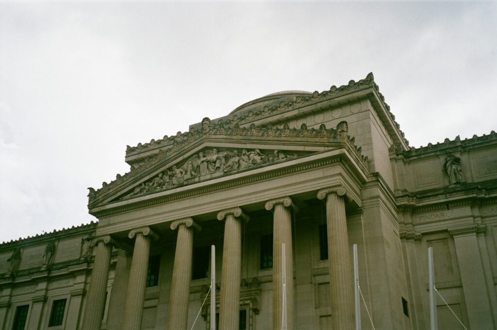 a large building with columns and a dome
