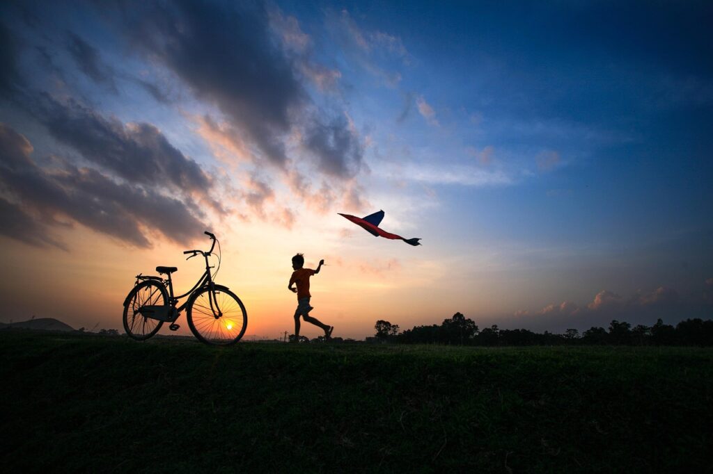 field, child, bike, kite, nature, sunset, fun, childhood memories, activity, playing, silhouette, vietnam