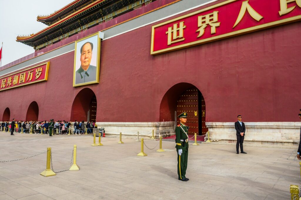 a group of people standing in front of a building