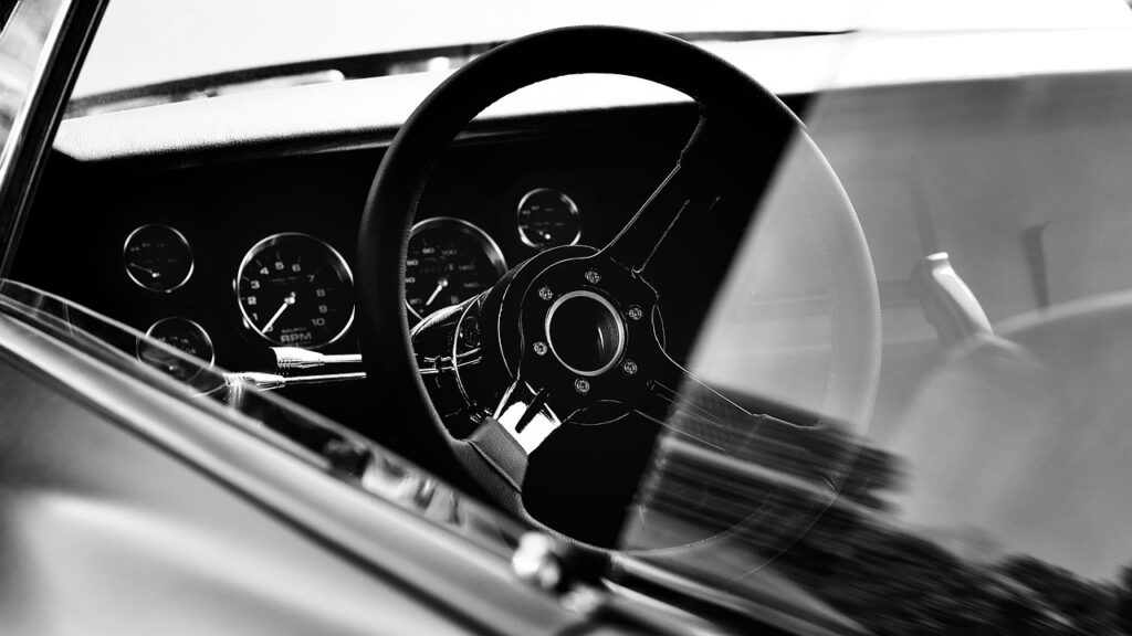 car, vehicle, steering wheel, car interior, dashboard, transportation, motor vehicle, automobile, monochrome, retro, vintage car, metal, wheels, car wallpapers, motor, luxury vehicle, sports car, black and white