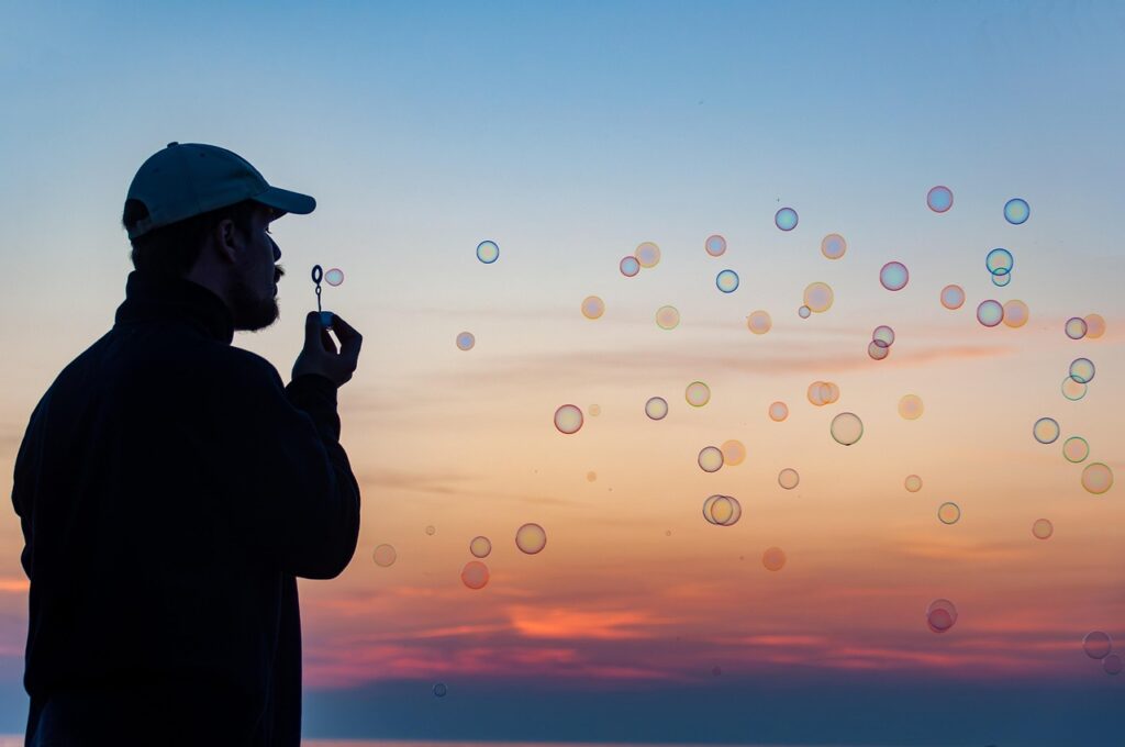 soap bubbles, blowing bubbles, sunset, nature, man, silhouette, life, dusk, twilight
