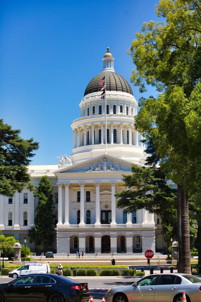 Front view of the iconic California State Capitol in Sacramento, showcasing its majestic dome and facade.