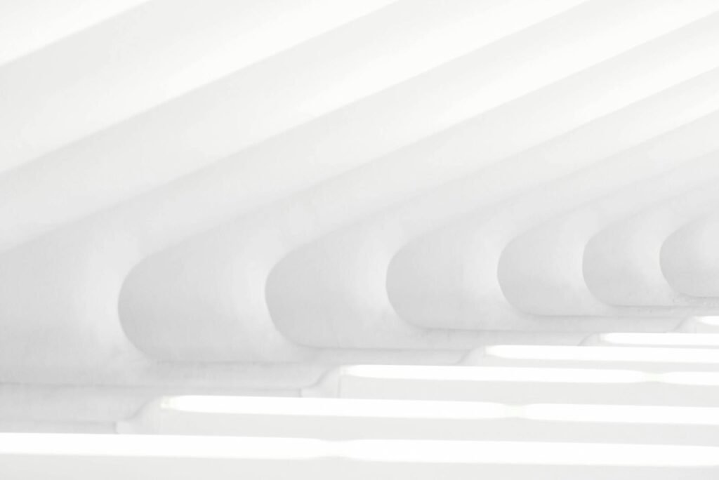 Minimalist white architectural interior showcasing futuristic design in New York.