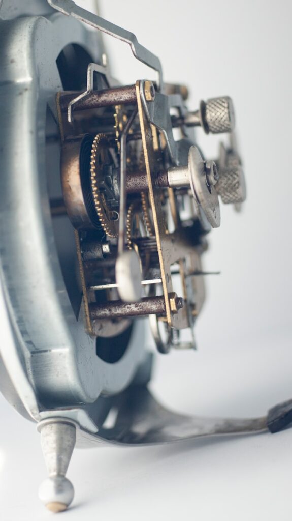 a close up of a clock with a white background
