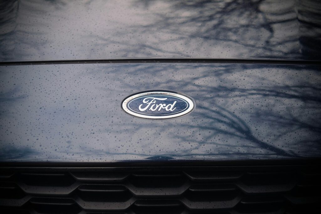 a close up of a ford emblem on a car