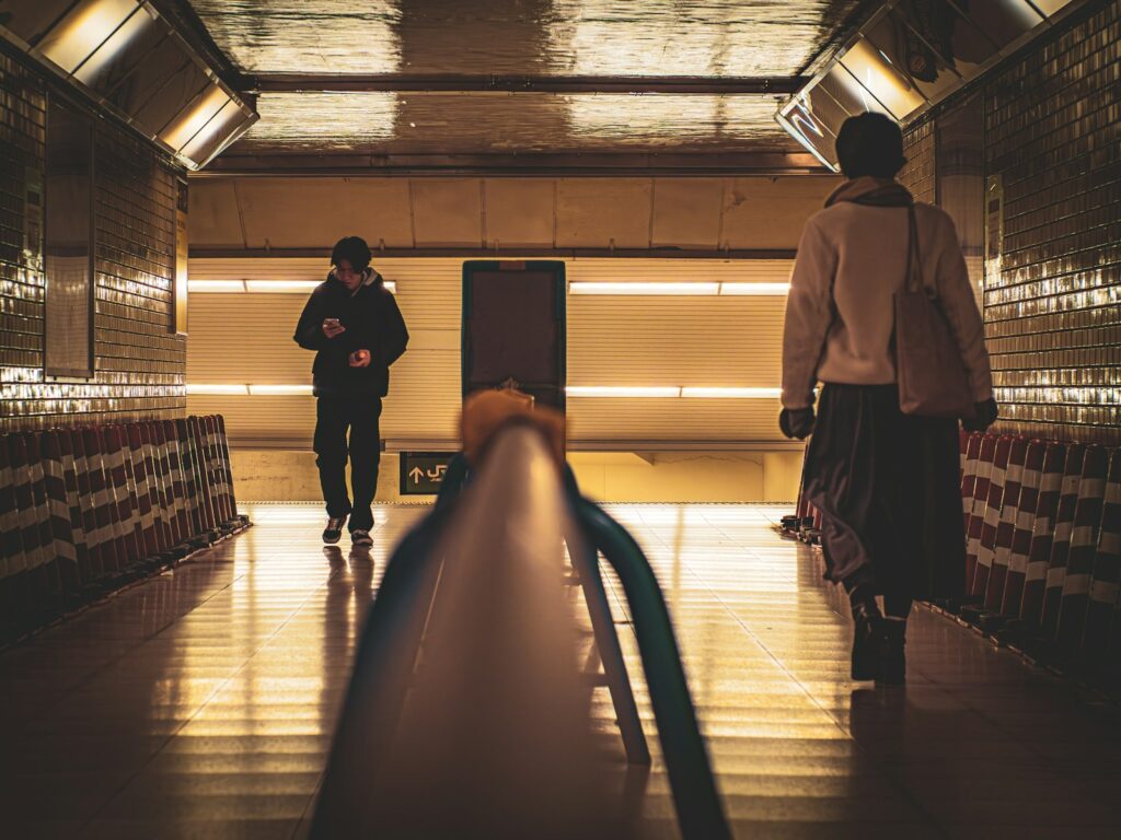 A couple of people that are standing in a building