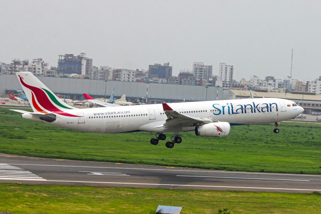A large passenger jet taking off from an airport runway