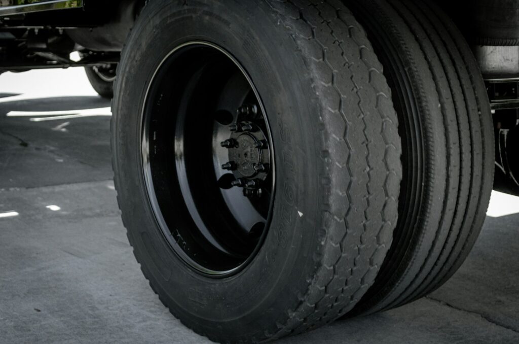 a close up of a large truck tire