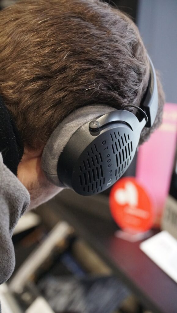 a man wearing a pair of headphones on top of his head