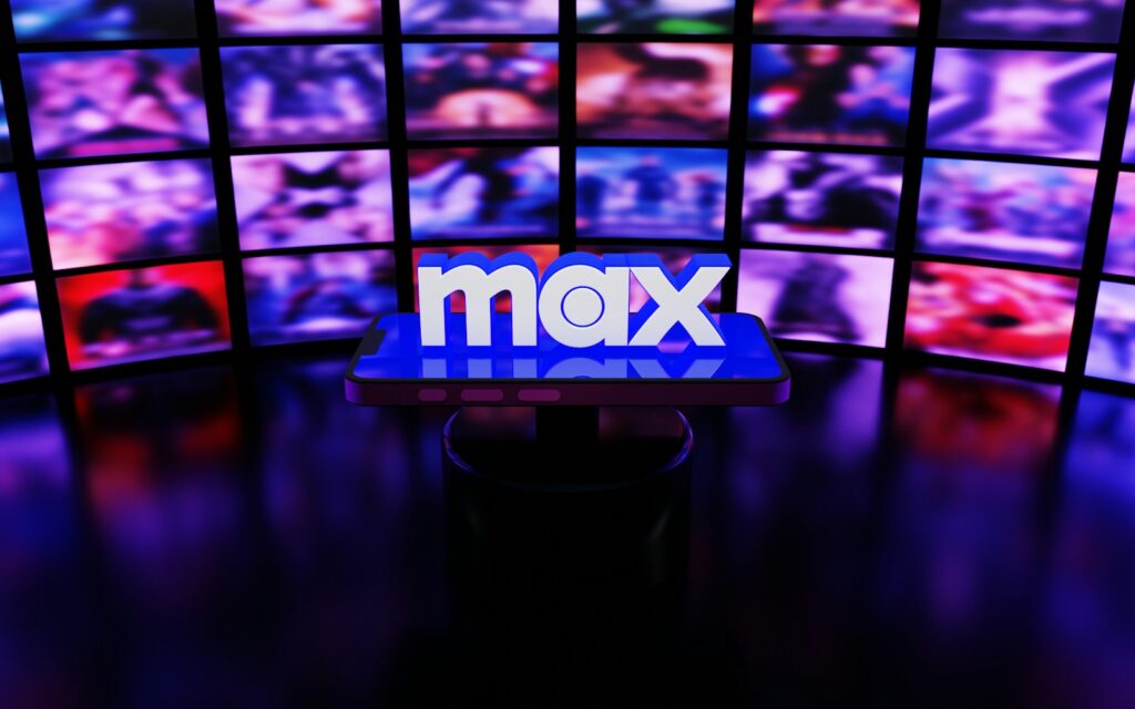 a television set with multiple television screens in the background