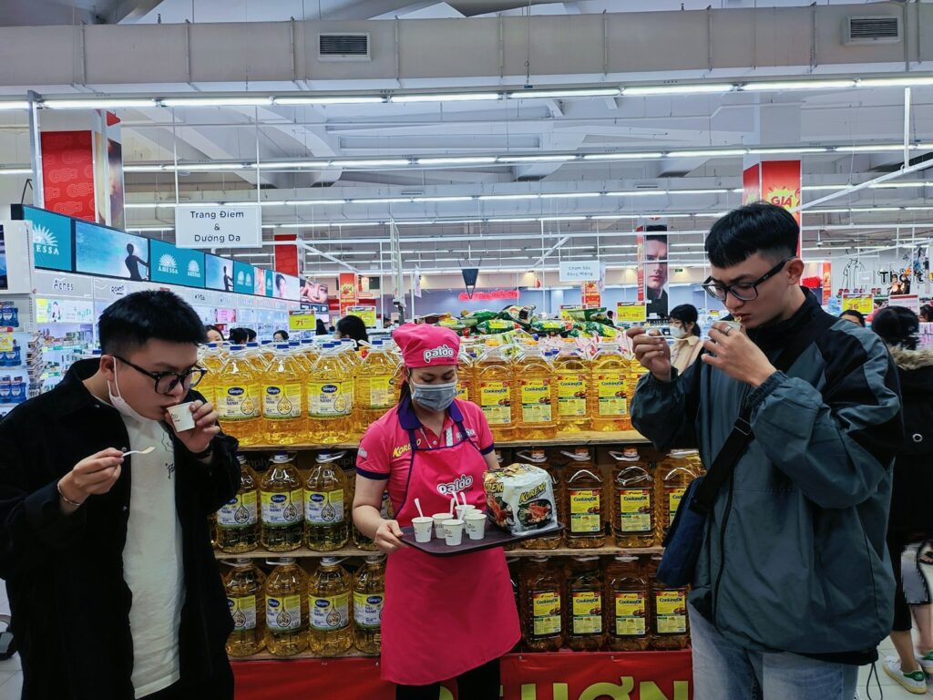 a couple of people that are standing in a store