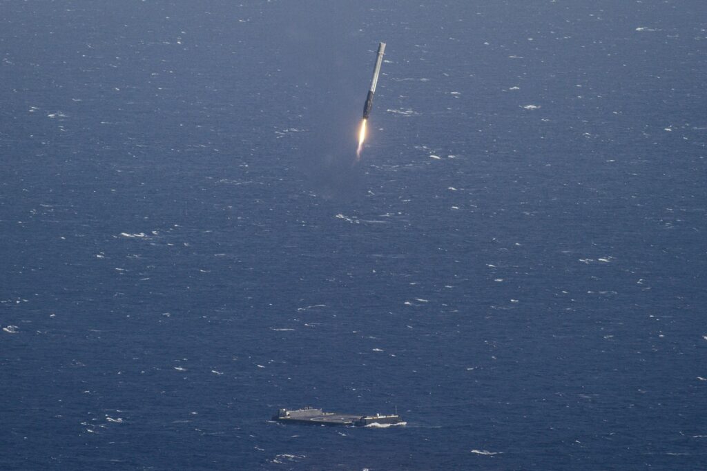 aircraft carrier and missile launching during daytime